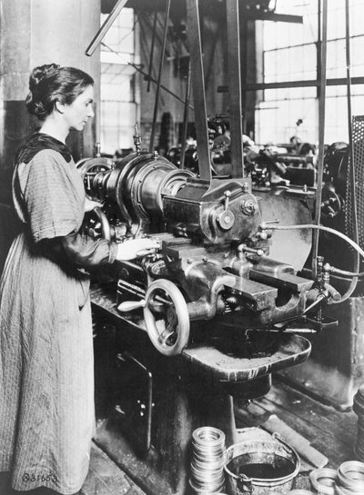 Woman working at internal thread milling machine, Norton Grinding Co., Worcester, Ma., during World War I by American Photographer