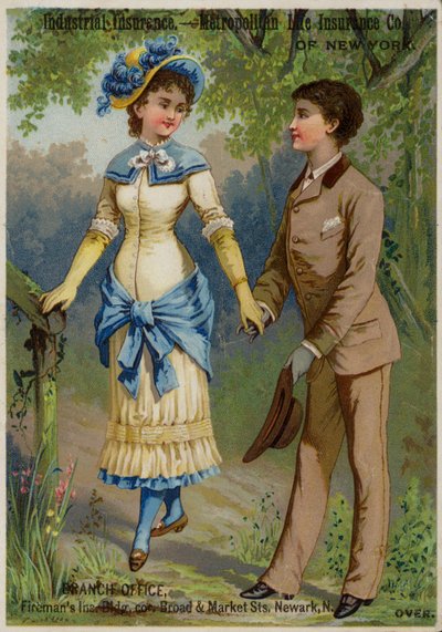 Couple strolling hand-in-hand by American School