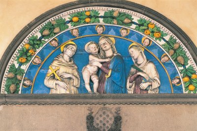 Glazed terracotta lunette depicting Madonna with Child between Saints by Andrea Della Robbia