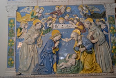 Nativity with St Francis and St Anthony by Andrea Della Robbia