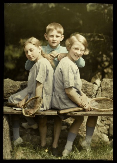 Portrait of Two Girls with Tennis Rackets and a Boy with a Tennis Ball by Anonymous