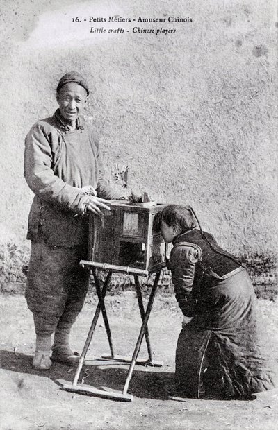 A Traveling Entertainer with an Image Box - Photograph of the Beginning of the 20th Century - Private Collection by Anonymous Anonymous