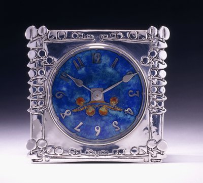 A square clock with a celtic motif in the Arts & Crafts style by Archibald Knox