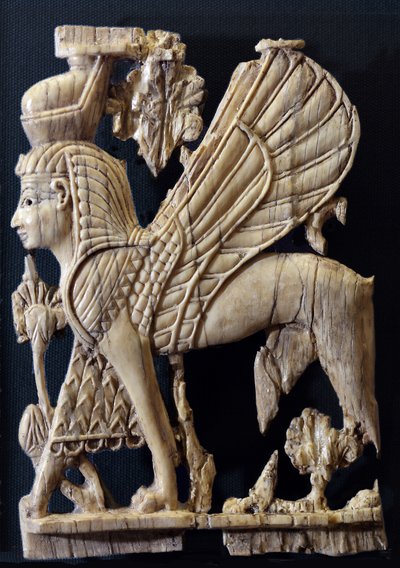 Winged Griffin with human face, Phoenician style ivory furniture decoration, Nimrud, 800-700 BC by Assyrian
