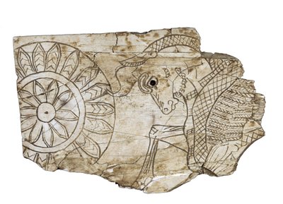 Plaque fragment depicting a winged bull from Nimrud, Iraq, 8th century BC by Assyrian School