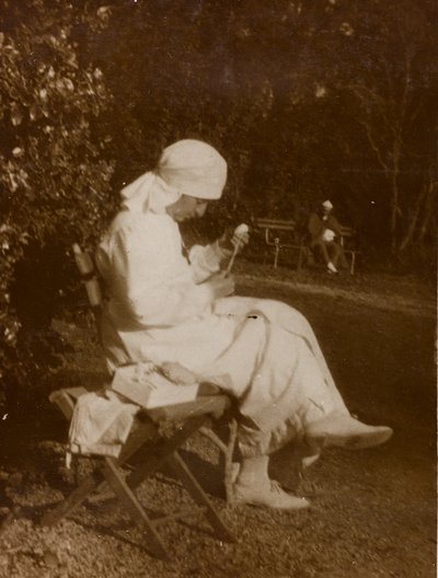 Album of the First World War in Friuli-Venezia Giulia: Portrait of a Red Cross Nurse in the Park of Villa Brazzà, Home to 17 of the Hospital of War in Soleschiano Manzano by Bourbon Del Monte