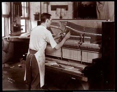 Man Working in the Hardman, Peck and Co. Piano Factory, New York, 1907 by Byron Company