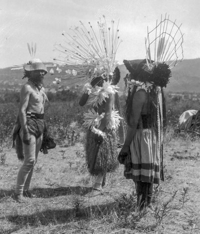Native American people and tribal roundhouse and ceremonial attire, California by C. Hart Merriam