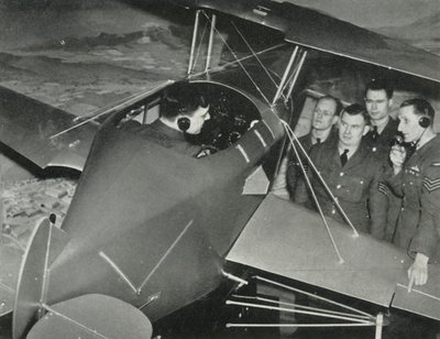 RAF personnel learning to fly in a flight simulator during the Second World War by Charles Brown