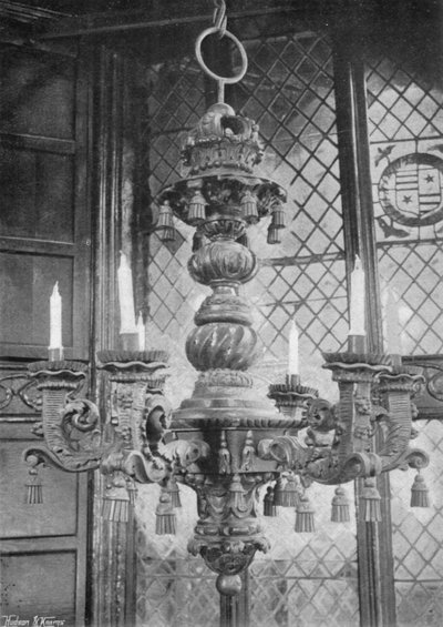 A Six-Light Oaken Chandelier by Charles Latham