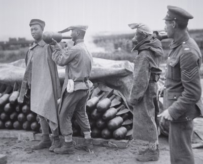 Chinese unit stocking aerial bombs at an ordnance depot in France by Chinese Photographer