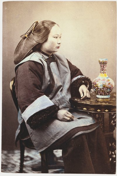 A Hand Tinted Photograph of a Young Chinese Woman by Chinese School