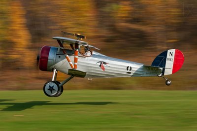 Vintage Biplane Taking Off by Darek Siusta