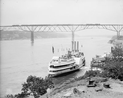 Passing Over and Under Poughkeepsie Bridge, Poughkeepsie, N.Y. by Detroit Publishing Co.