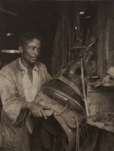 Man with a Saddle, c.1920 by Doris Ulmann