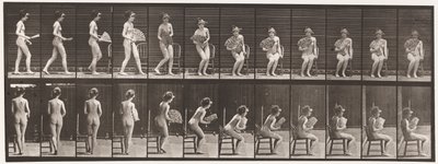 Sitting Down on Chair and Opening Fan by Eadweard Muybridge
