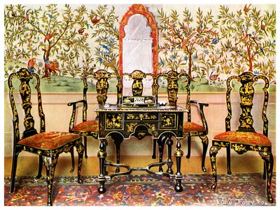 Black lacquer settee, chairs and table and red lacquer mirror by Edwin Foley
