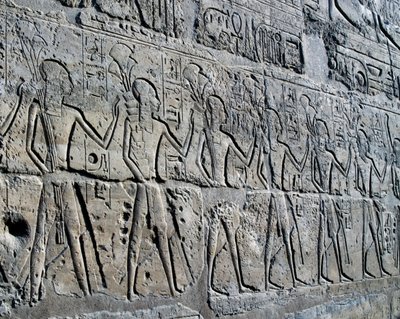 Characters symbolizing mining districts bringing their tributes to god, relief, Ramesses II Courtyard, Temple of Amun by Egyptian 19th Dynasty