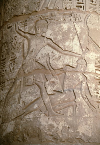 Ramses holding his Asian enemies by their hair while he is preparing to slay them, relief, Temple of Seti I, Kanais, Egypt, Egyptian civilization, New Kingdom, Dynasty XIX by Egyptian 19th Dynasty