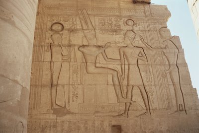 Relief depicting the lioness-headed goddess Mut presenting Ramesses II to an enthroned Amun, who gives him an ankh, from the Great Hypostyle Hall by Egyptian 19th Dynasty