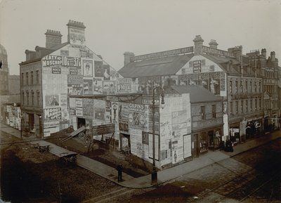 Advertising on houses, London by English Photographer