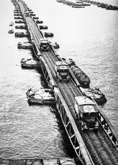 Ambulances of the Allied Landing Forces Using a Mulberry Pier of the Mulberry Artificial Harbour that had been Towed Across the Channel, 6th June 1944 by English Photographer