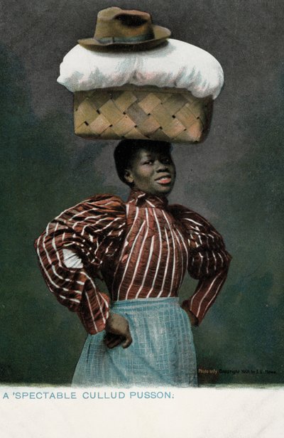 Black girl with a basket of linen, topped by a hat, on her head by English Photographer