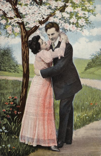 Couple Embracing Under a Blossom Tree by English Photographer
