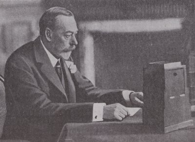 George V Broadcasting His Christmas Message to the British Commonwealth and Empire by English Photographer