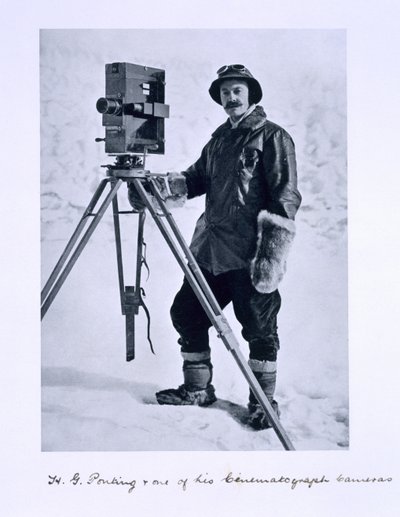 Herbert Ponting with a cinematographic camera on the Terra Nova expedition to the South Pole lead by Captain Scott, 1910-12 by English Photographer