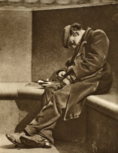 Homeless man on Blackfriars Bridge, from Wonderful London, published 1926-27 by English Photographer