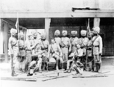 Lord Henry Rawlinson with Sikh Officers and Captured Burmese Tribesmen by English Photographer