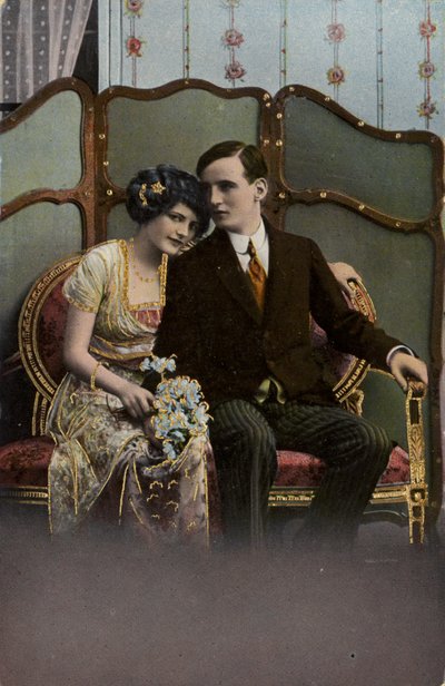 Man and woman with a bunch of flowers by English Photographer