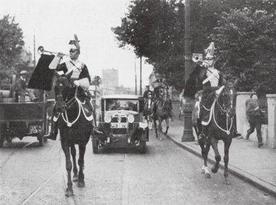 Mounted Heralds of Arms Preceding an Official Car, London by English Photographer
