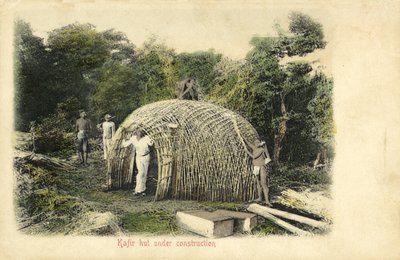 Native hut under construction by English Photographer