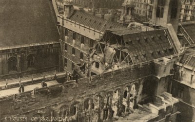 The Houses of Parliament, London, showing bomb damage during WW2 by English Photographer
