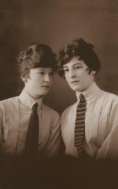 Two young Edwardian women wearing ties by English Photographer