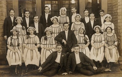 Unusual group of young men and women, early 20th century by English Photographer