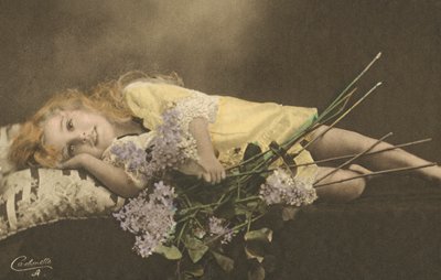Young Girl and Flowers by English Photographer