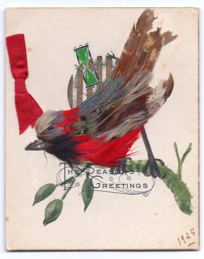 A Victorian Christmas card of a robin made out of feathers by English School