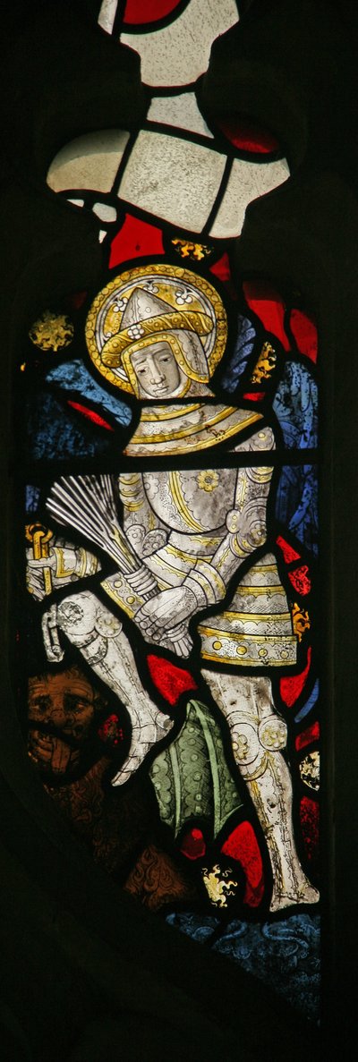 A detail from the east window depicting a member of the angelic Hierarchy, a Power by English School