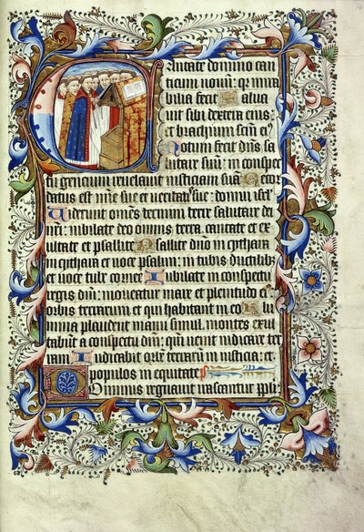 A page from a psalter in Latin, with a historiated initial depicting a group of monks standing before a lectern chanting, c.1455 by English School