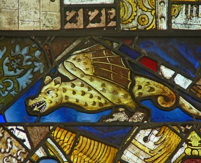 A panel in the east window depicting a dragon by English School