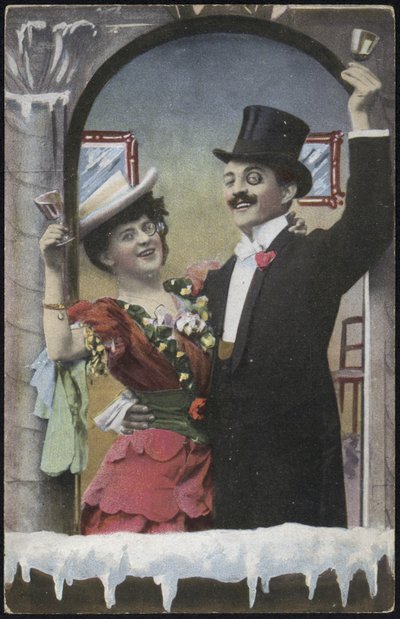 A well-dressed couple laughing by English School