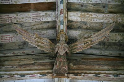 View of one of the carved wooden angels in the nave by English School