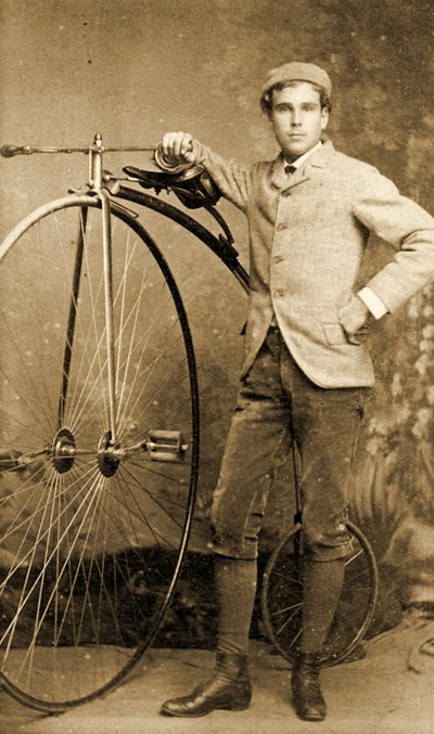 Man standing next to his Penny-Farthing, c.1890 by English School