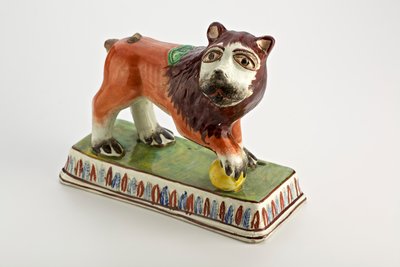 Staffordshire lion figure on rectangular base, c.1800-50 by English School