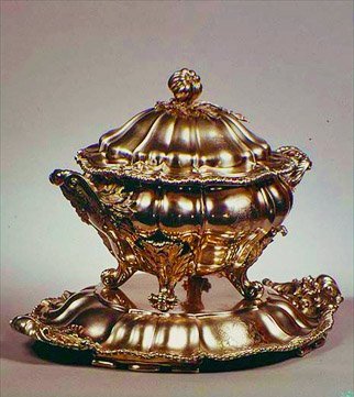 Tureen, melon-shaped, with pomegranate finial, applied gadrooned border and foliate handles, by Garrards, London, 1847 by English School