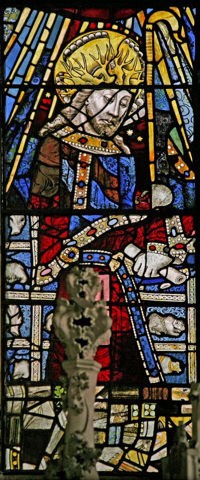Window depicting Christ (composite figure) - with jewels of inset coloured glass by English School