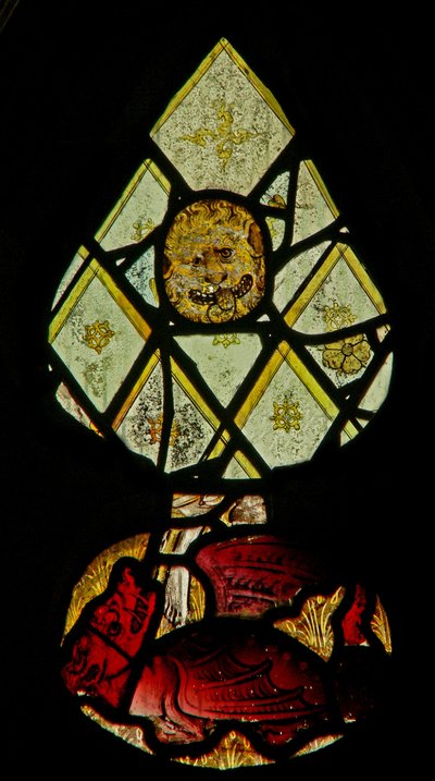 Window depicting a dragon and a lion